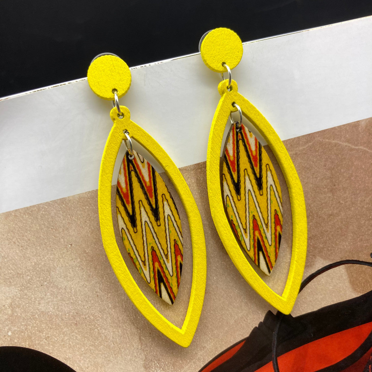 Wooden teardrop shaped earrings