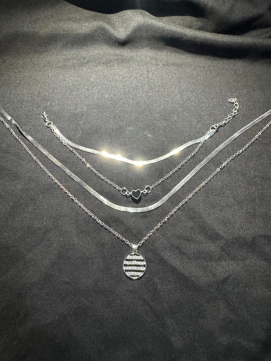 multi-layered stainless steel necklace with a heart charm