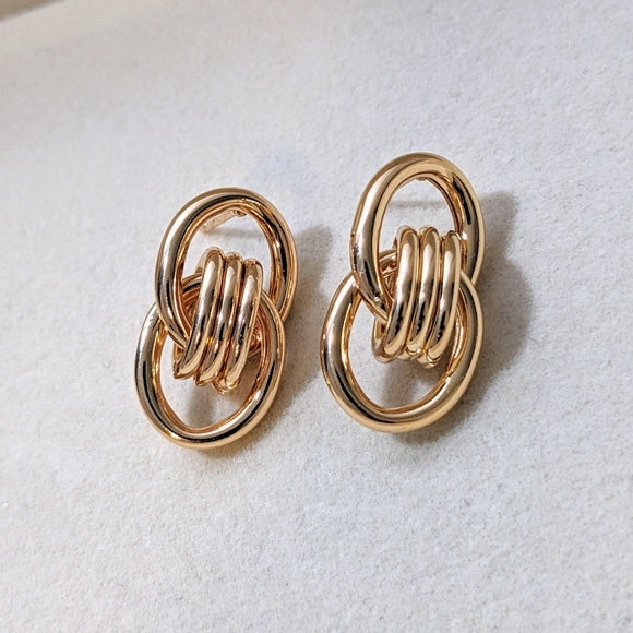gold-colored geometric knot link drop dangle earrings