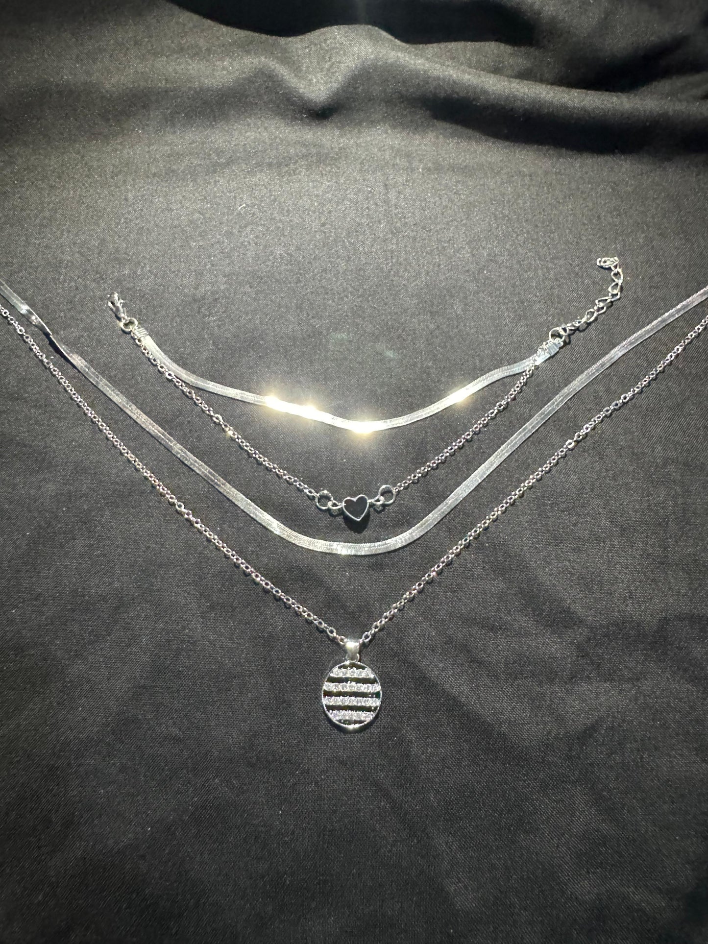 multi-layered stainless steel necklace with a heart charm
